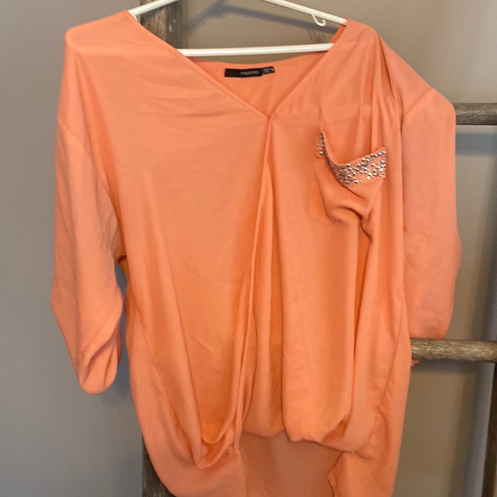 Maurice’s medium woman’s.  peach shirt .